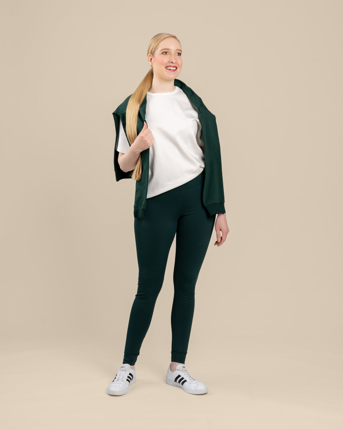 Tummanvihreät pitkät leggingsit