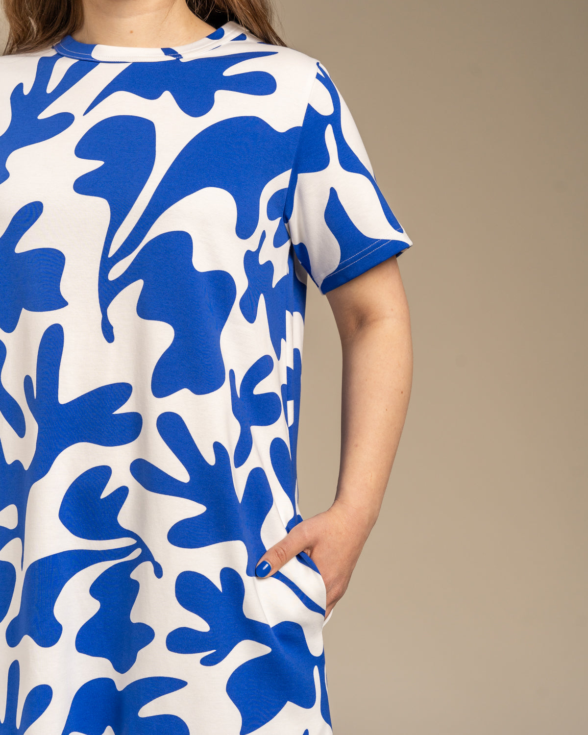 Poimuhelmainen mekko, Como Toive