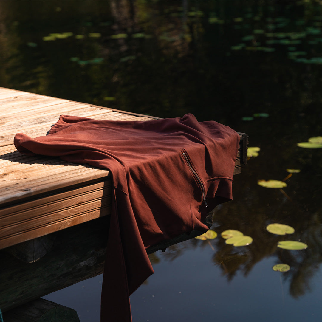 Toive ruosteenpunainen half-zip.